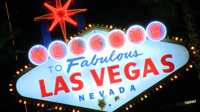 Welcome to Vegas sign at night - fast zoom in