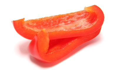 Two slices of pepper on a white background.