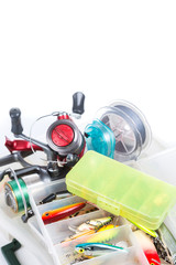 fishing tackles and lure in storage boxes