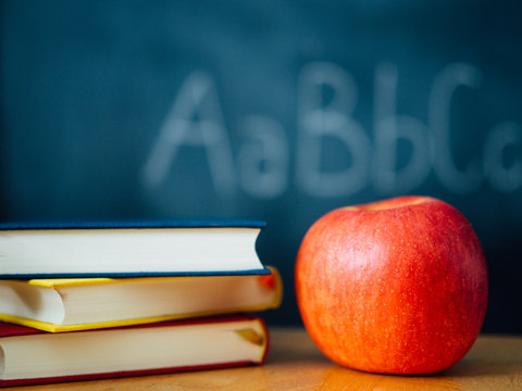 An apple and books for school