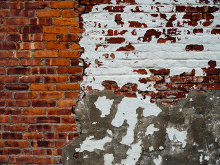 Old brick wall with white paint