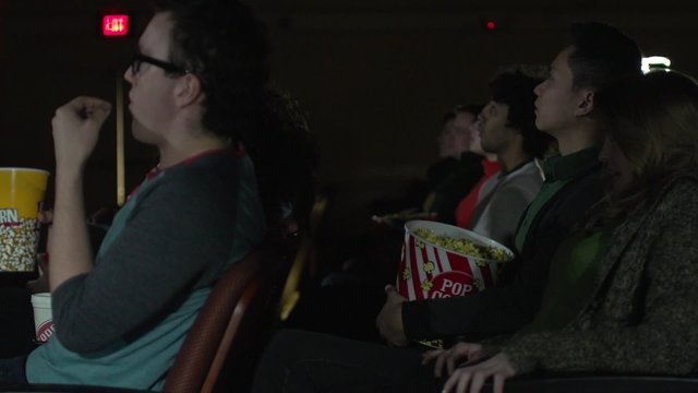 Young people watching a movie