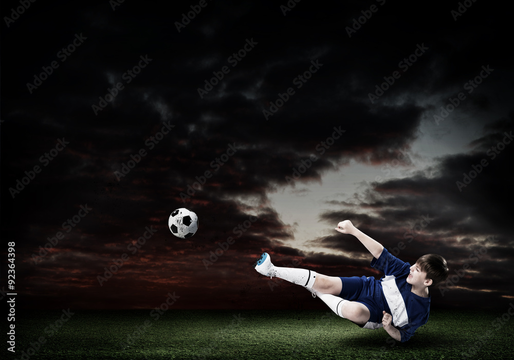 Canvas Prints Young soccer player