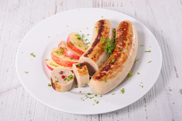 grilled white sausage with apple