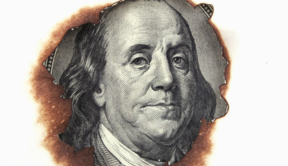 burning dollar bill