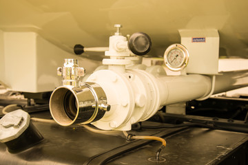 water valves at the rear of a fire engine.