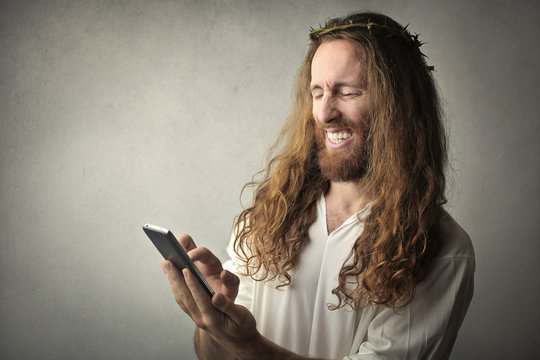 Jesus using a smartphone
