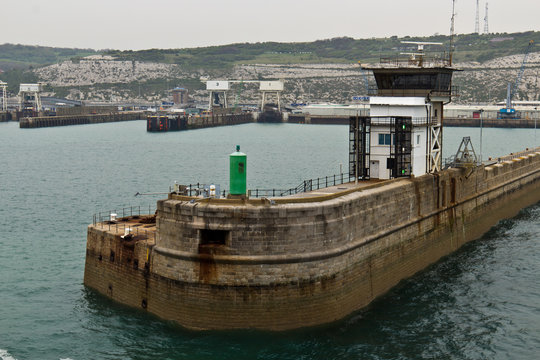 Man-made breakwater structure at port entry