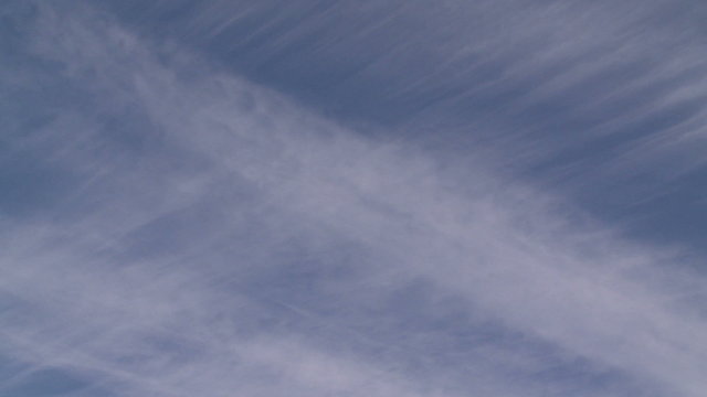 Plane descending from the clouds