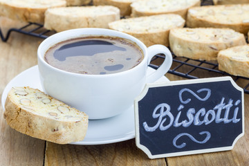 Traditional Italian homemade biscotti with almond and cup of coffee