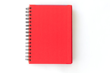 spiral red notebook on white background - obrazy, fototapety, plakaty