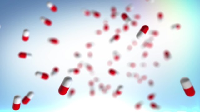 Medical drug background.Camera flies through the pills