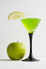 Apple cocktail mixed drink with apple slice