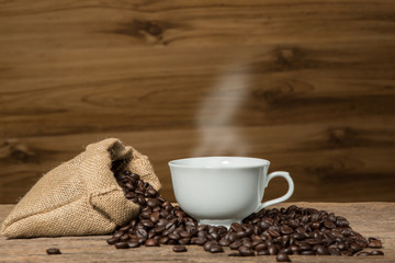 Coffee bean and white cup