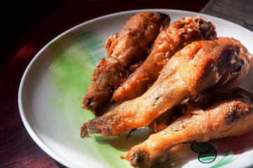 Fried chickens drumstick on dish