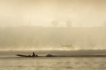 The boat in mist.