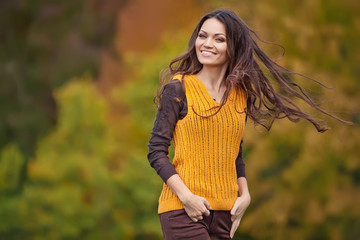 woman in autumn forest 