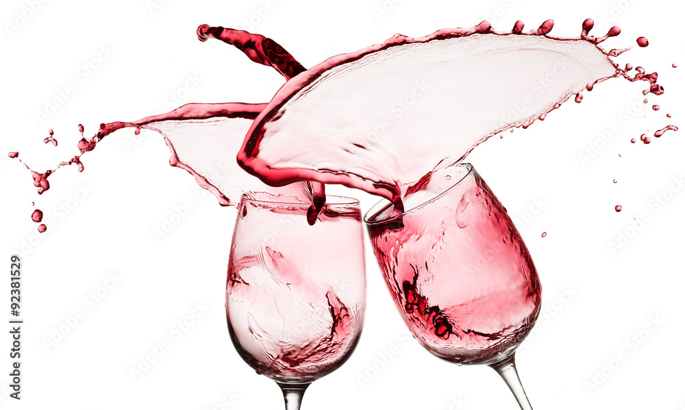 Wall mural red wine splashes from two glasses isolated on the white backgro