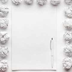 Fototapeta na wymiar blank sheet of paper and pen creative process concept