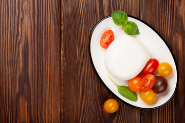 Mozzarella, tomatoes and basil
