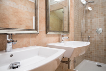 Two white washbasins