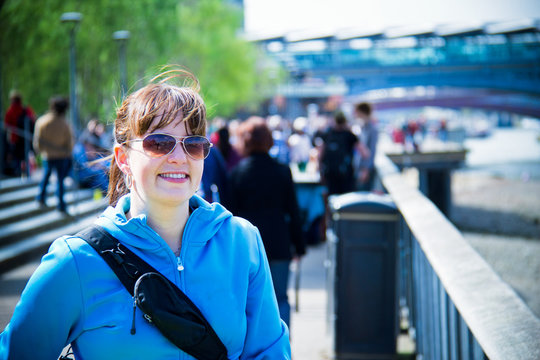 Smiling woman tourist in London, England