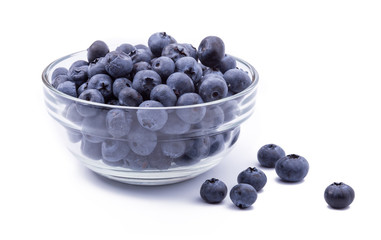 ripe blueberries in bowl isolated on white