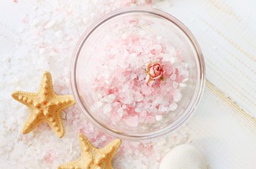 Bowl of sea salt herbal pink, sea shells, aromatherapy skin care background, airy romantic backdrop,  soft light, soft focus