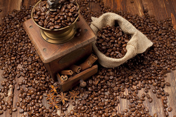 Coffee beans and old grinder