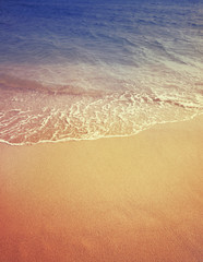 Fototapeta na wymiar Wave of sea water and sand