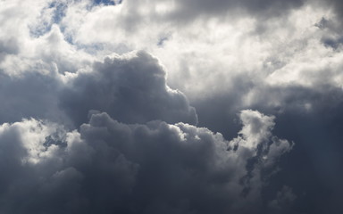 Thunderclouds in sun rays