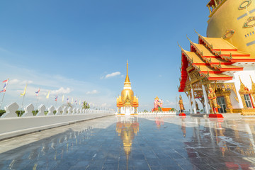 Naklejka premium Buddha statue and ancient giants in Thai temple 