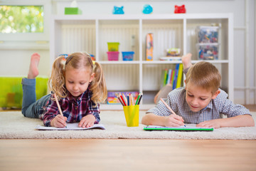Two cute children at home