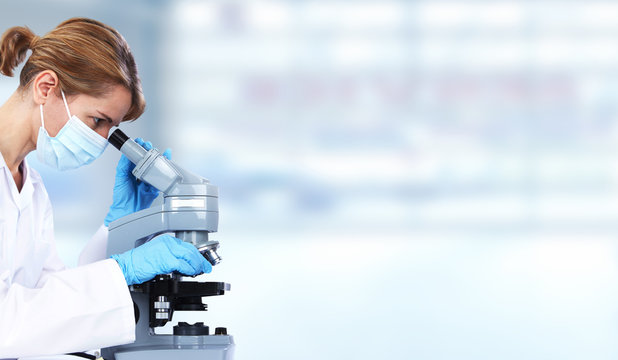 Doctor Woman With Microscope.