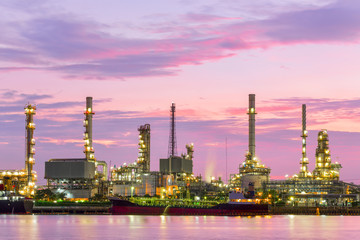 Oil refinery at dawn with twilight sky in Bangkok ,Thailand
