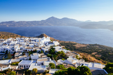 Fototapeta na wymiar Scenic view of ocean and traditional Greek village Plaka, Greece