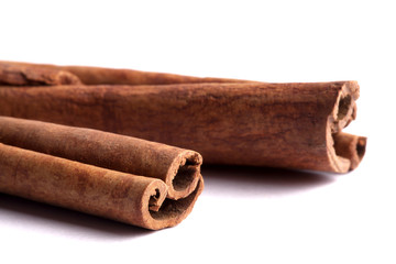 Cinnamon sticks isolated on white.