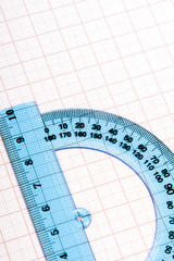 drawing tools on blue graph paper with copy space