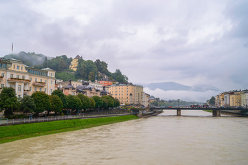 Fototapeta premium Palaces in Salzburg on a foggy rainy day