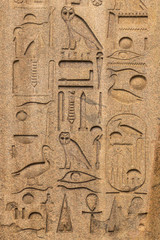 Egyptian hieroglyphs on an ancient obelisk