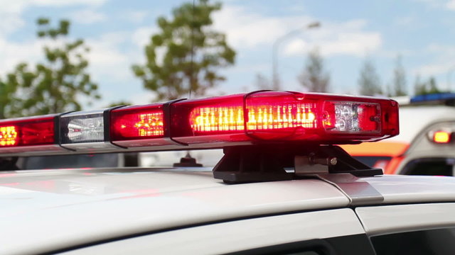 Flashing emergency siren lights on rescue truck