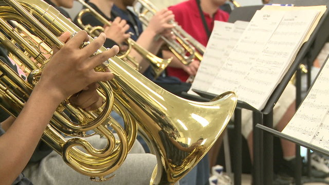 Middle school students practicing in Music Class