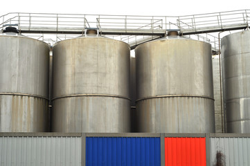Stainless steel industrial silos.