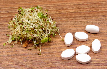 Tablets supplements with alfalfa and radish sprouts, healthy nutrition