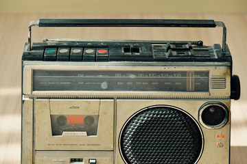 Obraz premium Dusty old radio with one cassette player