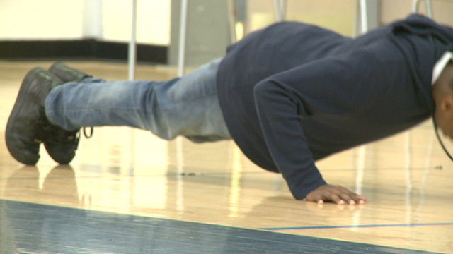 Middle school student doing push ups