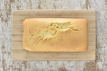Butter cake on wood plate (Top view)