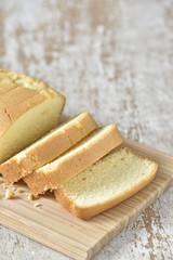 Slice butter cake on wood plate