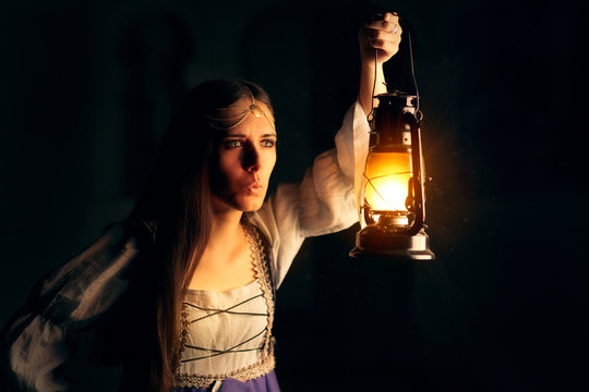 Curious Medieval Princess Holding Lantern Looking Outside