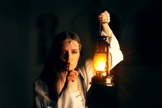 Medieval Princess Holding Lantern and Keeping a Secret